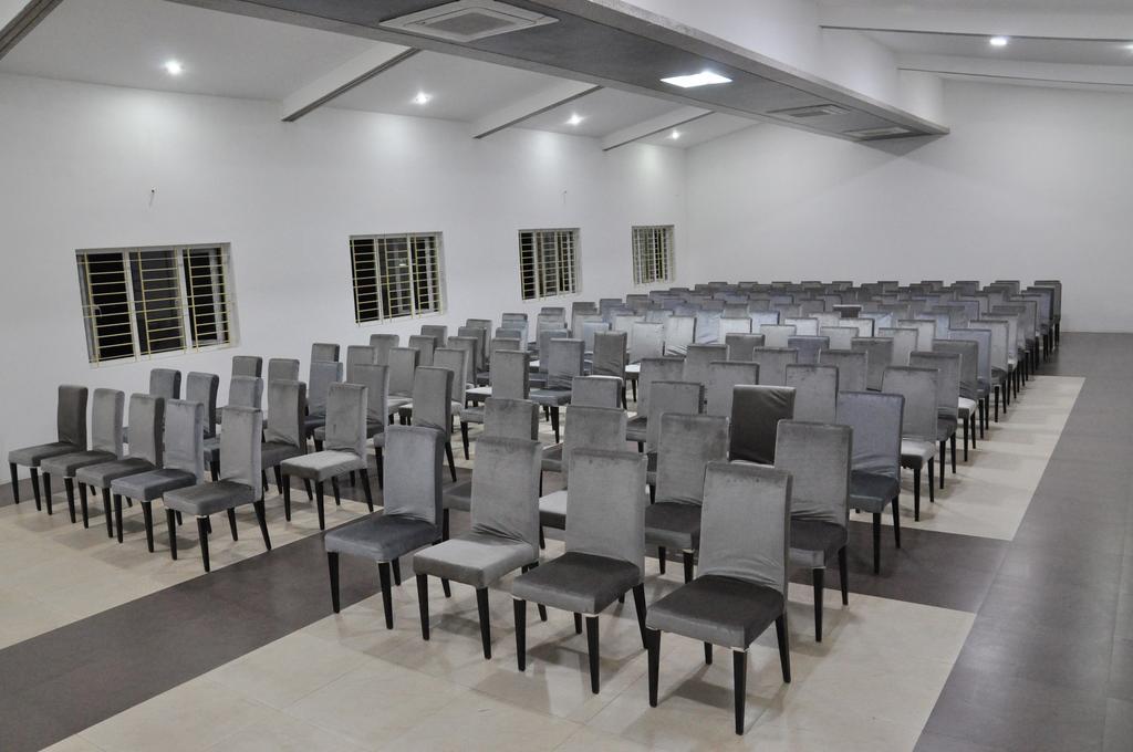 Hotel The Home Tiruppur Quarto foto